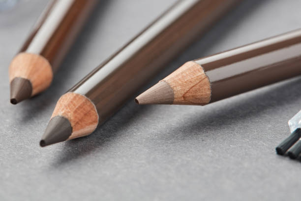Three colors of eyebrow pencils stock photo