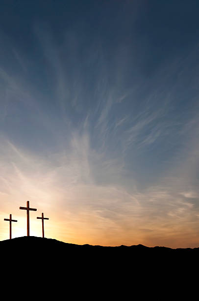 Three Crosses on Good Friday With Dramatic Sunset- Copy  good friday stock pictures, royalty-free photos & images