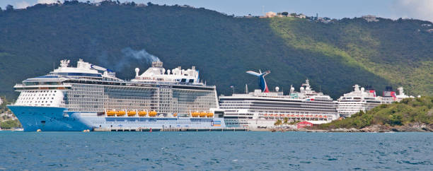 Three Cruise Ships in Caribbean Port stock photo