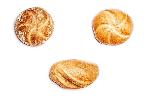Three different bread rolls on white background, high angle stock photo