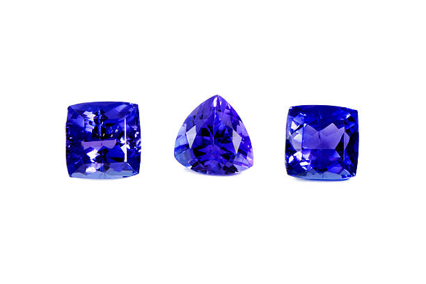 Three Different Tanzanite Stones Three Different Tanzanite Stones Isolated on White Background zoisite stock pictures, royalty-free photos & images