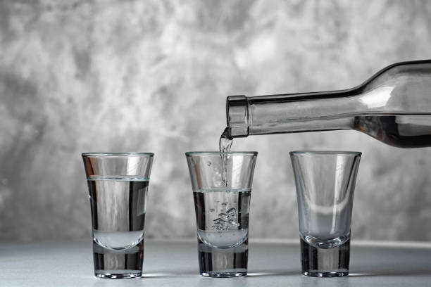 Three glasses of vodka close-up. stock photo