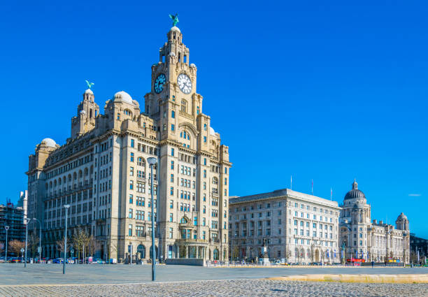 Three Graces buildings in Liverpool, England Three Graces buildings in Liverpool, England cunard building liverpool stock pictures, royalty-free photos & images