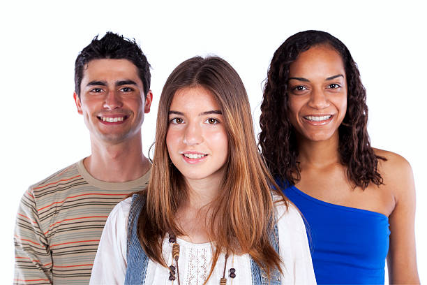 Three happy teenagers stock photo