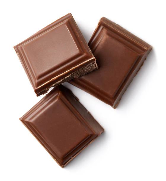 drei stücke von milchschokolade - schokolade stock-fotos und bilder