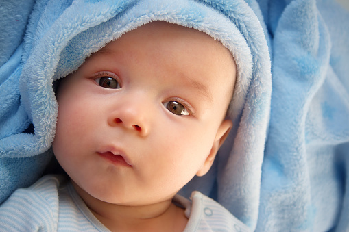 Three Month Old Baby Wrapped In Blue Blanket Stock Photo ...