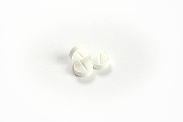Three Pills on white background stock photo