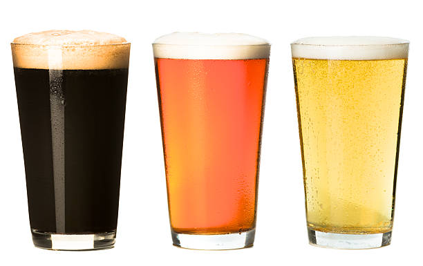 Three Pint Beer Glasses Isolated on White Background Three Pint Beer Glasses Isolated on White Background pint glass stock pictures, royalty-free photos & images