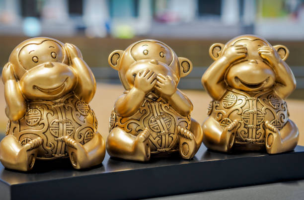 Three Wise Monkeys stock photo