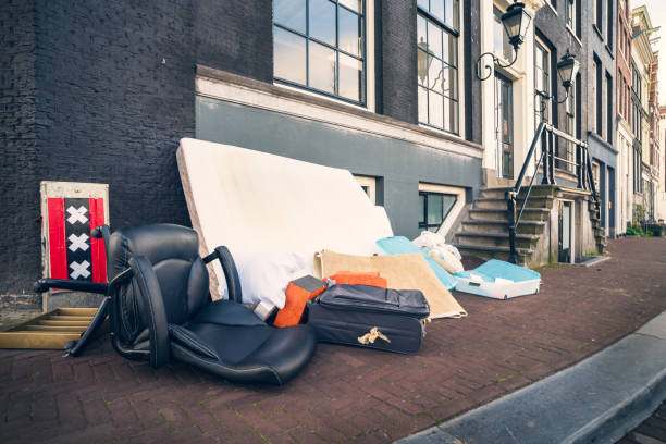 Throwing away unnecessary things that anyone can pick up, old Amsterdam tradition, Netherlands stock photo