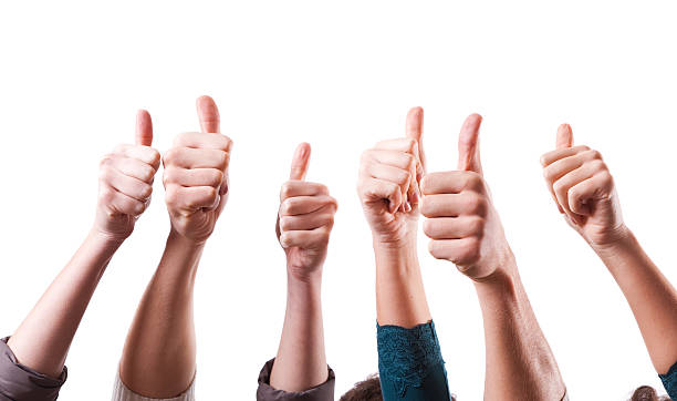 Thumbs Up on White Background stock photo