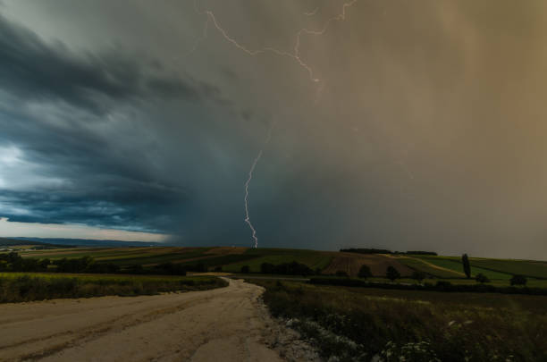 thunderstorm with rain clouds and lightning - sturm imagens e fotografias de stock