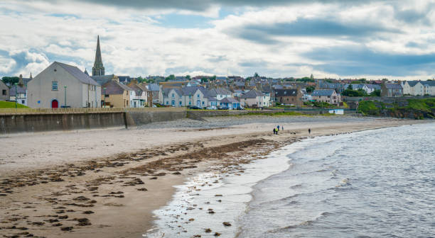 Thurso beach in a cloudy summer afternoon, Caithness, Scotland. Thurso beach in a cloudy summer afternoon, Caithness, Scotland. caithness stock pictures, royalty-free photos & images