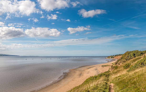 Thurstaston beach on the wirral UK. Thurstaston beach is an Amazing cliff top walk with stunning views across the River Dee to North Wales. the wirral stock pictures, royalty-free photos & images