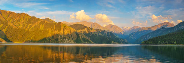 Tianchi Lake in Xinjiang province,China Tianchi Lake in Xinjiang province,China tien shan mountains stock pictures, royalty-free photos & images