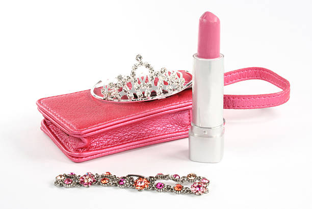 tiara, purse, jewelry and cosmetics stock photo