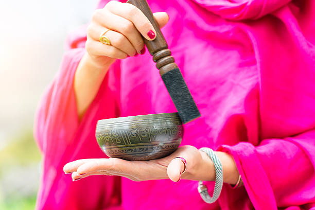 Tibetan bell Tibetan bell in hand and played tibetan ethnicity stock pictures, royalty-free photos & images