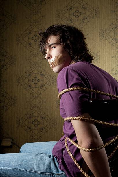 Best Tied Up Men Chair Rope Stock Photos, Pictures 