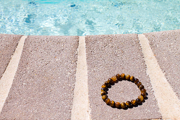Tiger Eye Bracelet By the Pool stock photo