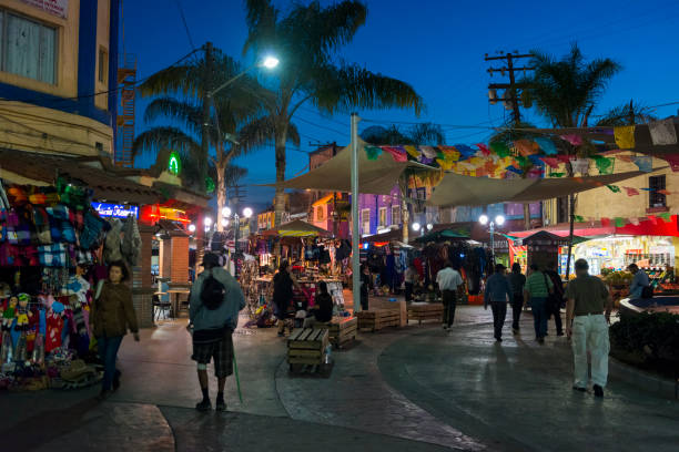 тихуана, мексика туристический район в ночное время - tijuana стоковые фото и изображения