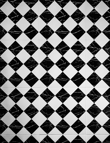 Tiles. Vintage black and white tiles texture background floor.