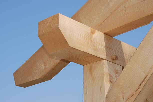 Timber frame construction for a house Timber-frame construction roof beam stock pictures, royalty-free photos & images