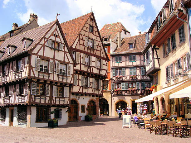 Timbered houses of Colmar, France Picturesque square in the Alsatian city of Colmar, France colmar stock pictures, royalty-free photos & images