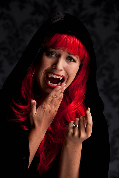 Red Head Vampire Stock Photos, Pictures & Royalty-Free Images - iStock
