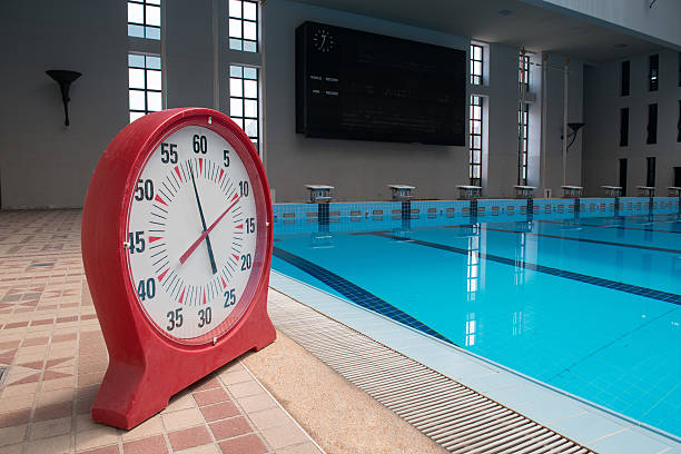 Timer clock in a swimming pool stock photo