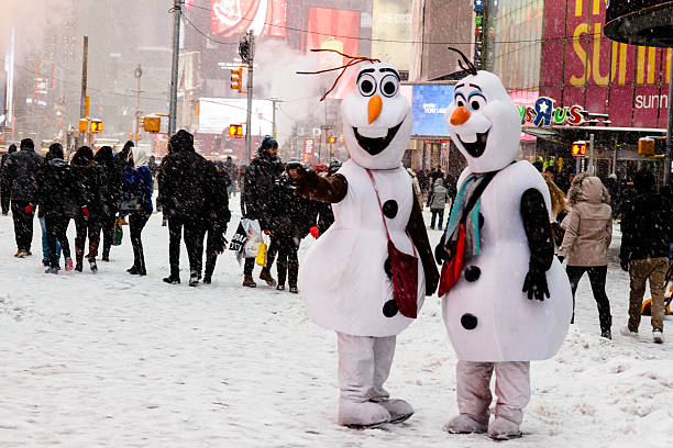Times Square costumed characters. Olaf from Disney's Frozen. NYC Snow stock photo