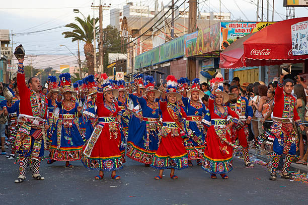 Tinku Dance Group Arica, Сhile - January 24, 2016: Colourfully dressed Tinku dance group performing as part of the annual Carnaval Andino con la Fuerza del Sol in Arica, Chile. The event attracts around 10,000 dancers and musicians. hot peruvian women stock pictures, royalty-free photos & images