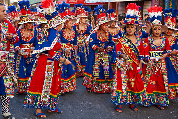Tinku Dance Group Arica, Сhile - January 24, 2016: Colourfully dressed Tinku dance group performing as part of the annual Carnaval Andino con la Fuerza del Sol in Arica, Chile. The event attracts around 10,000 dancers and musicians. hot peruvian women stock pictures, royalty-free photos & images