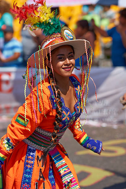 Tinku Dancer Arica, Сhile - January 24, 2016: Colourfully dressed Tinku dancer performing as part of the annual Carnaval Andino con la Fuerza del Sol in Arica, Chile. The Tinku dance originates in Bolivia and is a ritualised fight. hot peruvian women stock pictures, royalty-free photos & images