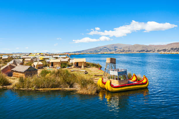 Titicaca Lake Uros floating island near Puno city, Peru peru stock pictures, royalty-free photos & images