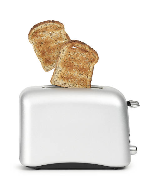 Toast popping out of a toaster Two slices flying out of a silver toaster.  File comes with a clipping path. 7 grain bread photos stock pictures, royalty-free photos & images