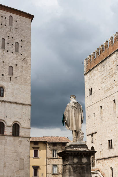 Todi - back view of Giuseppe Garibaldi statue.  Cloudy day on Garibaldi square, Umbria in Central Italy stock photo