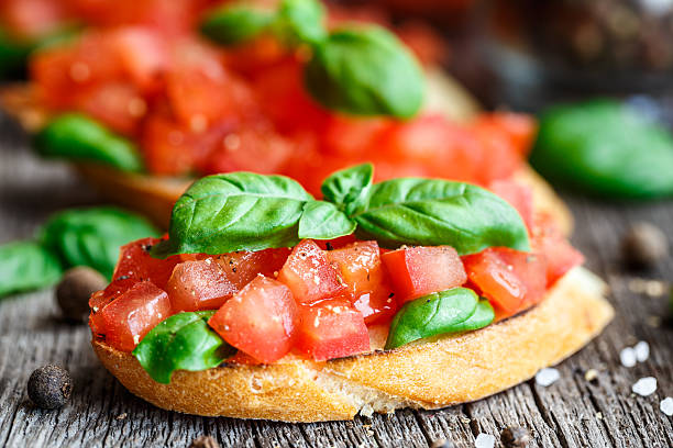 Tomato bruschetta with tomatoes and basil stock photo