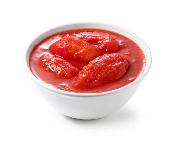 Tomato puree in a white bowl Tomato puree in a white bowl peeled stock pictures, royalty-free photos & images