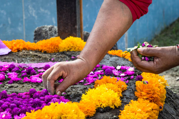 Tomb being adorned - Muertos Day stock photo