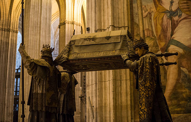 Tomb of Christopher Columbus in Seville Cathedral, Spain The tomb of Christopher Columbus in the Seville Cathedral in Seville, Spain. The allegorical figures holding it aloft represent the four kingdoms of Spain during Columbus’ life: Castille, Aragon, Navara and Leon. seville cathedral stock pictures, royalty-free photos & images