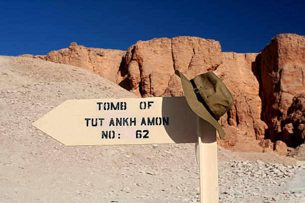 Tomb of Tut This Way Explorer's Hat on Sign in Valley of The Kings, Egypt king tut stock pictures, royalty-free photos & images