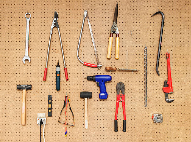 Tool Wall  pegboard stock pictures, royalty-free photos & images