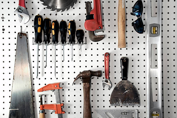 Tools. Tools on a white pegboard. pegboard stock pictures, royalty-free photos & images