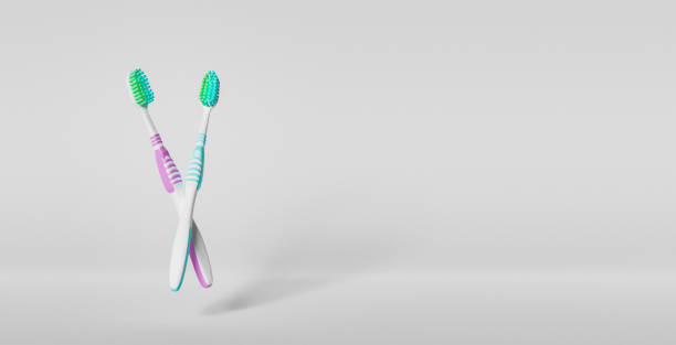 toothbrushes on white background stock photo