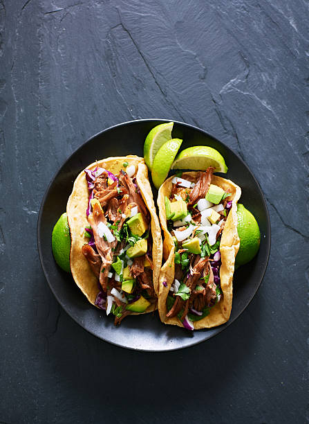 top down photo of two mexican carnitas tacos stock photo