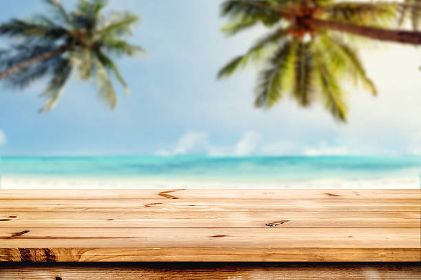 Top of wooden table on beach stock photo