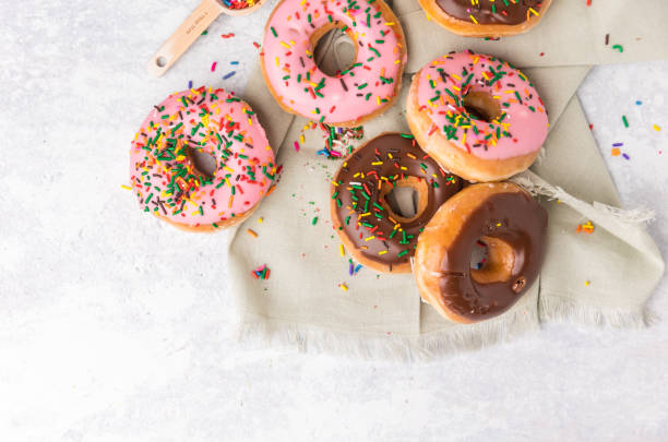 Top rule of thirds sprinkled donuts stock photo