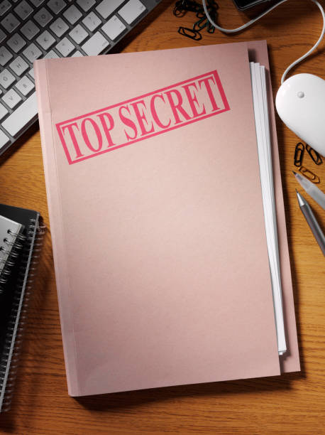 Top Secret Office Document Top secret document folder on a desk in the office. Copy spaceClick on the links below to see more of my stationary and finance images. top secret stock pictures, royalty-free photos & images