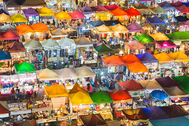 Top view colourful over Weekend market at night Arial view roof top over colorful weekend nigh market flea market photos stock pictures, royalty-free photos & images