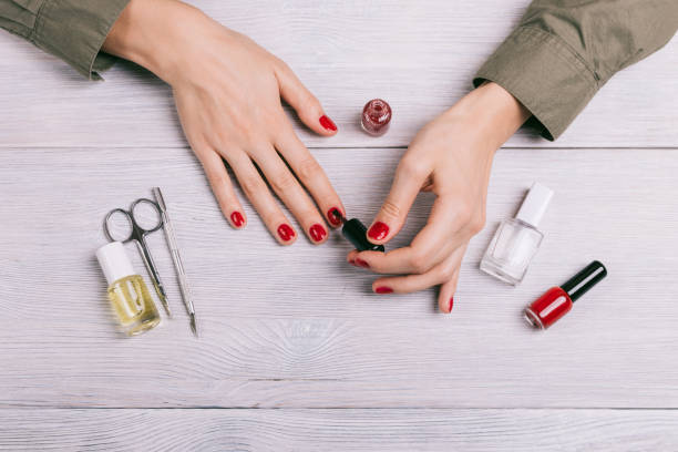 Top view of a woman doing a manicure stock photo